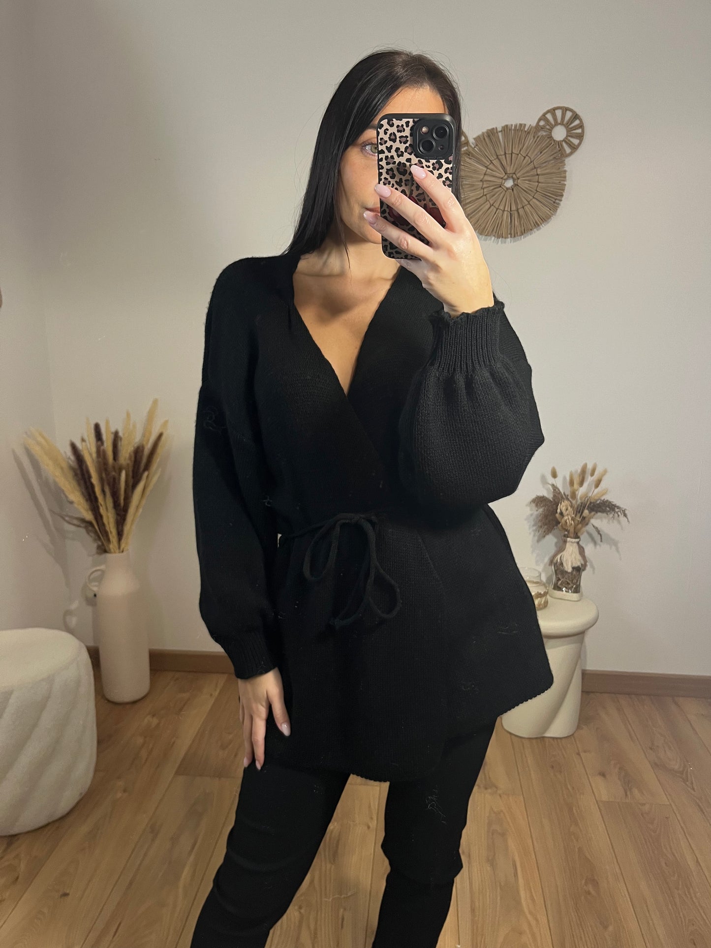 Pull cache cœur noir